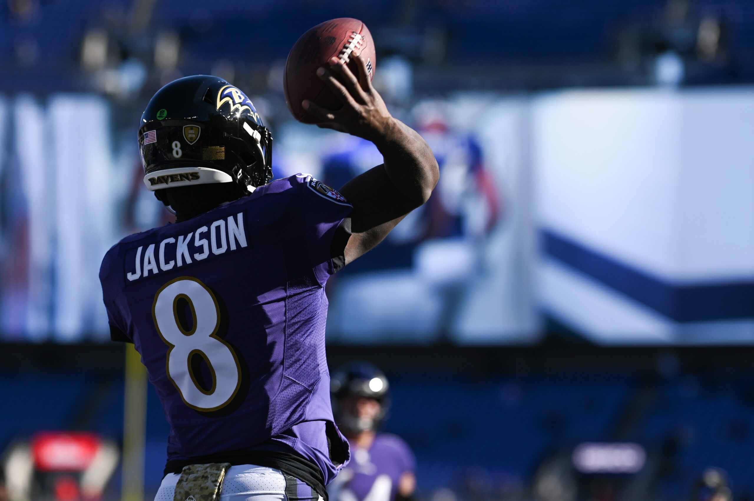 Baltimore Ravens quarterback Lamar Jackson (8) warms up before the game against the Carolina Panthers at M&T Bank Stadium. Mandatory Credit: Tommy Gilligan-USA TODAY Sports