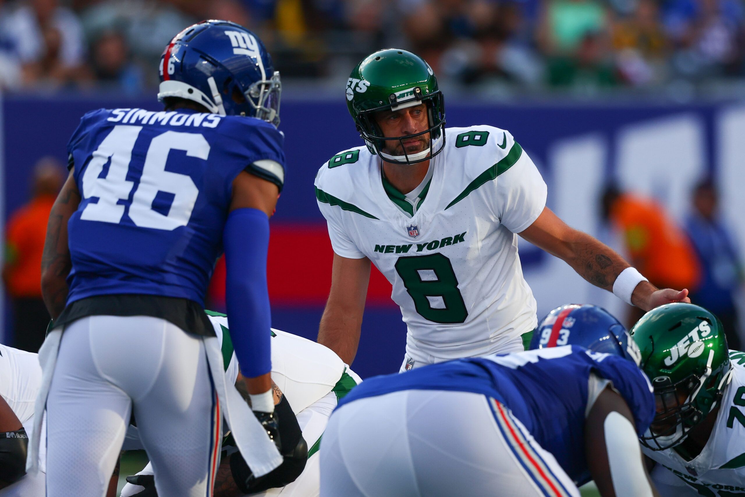 New York Jets quarterback Aaron Rodgers (8) against the New York Giants during the first half at MetLife Stadium. Mandatory Credit: Ed Mulholland-USA TODAY Sports