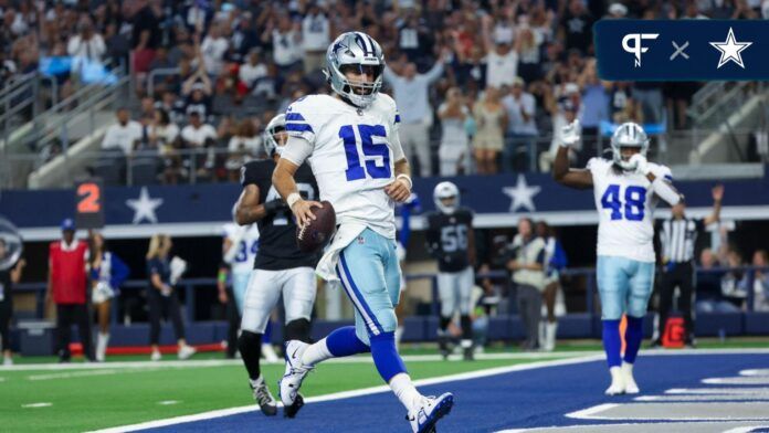 Dallas Cowboys quarterback Will Grier (15) runs for a touchdown during the second half against the Las Vegas Raiders at AT&T Stadium.