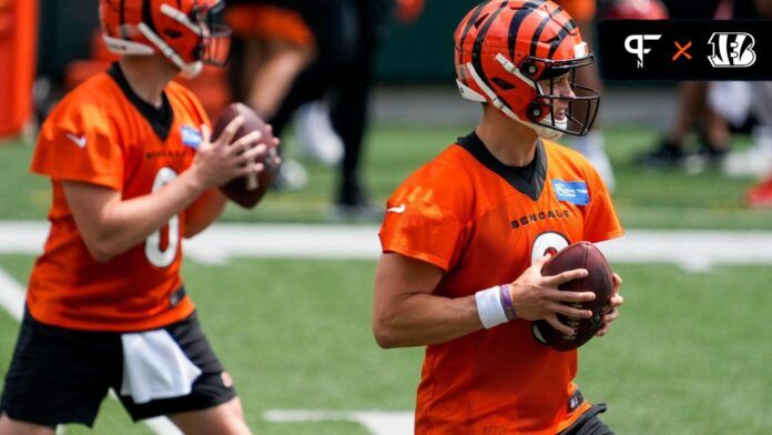 Cincinnati Bengals quarterback Joe Burrow (9) and quarterback Jake Browning (6) drops back in a passing drill during an off-season workout inside Paycor Stadium in downtown Cincinnati on Wednesday, June 14, 2023.