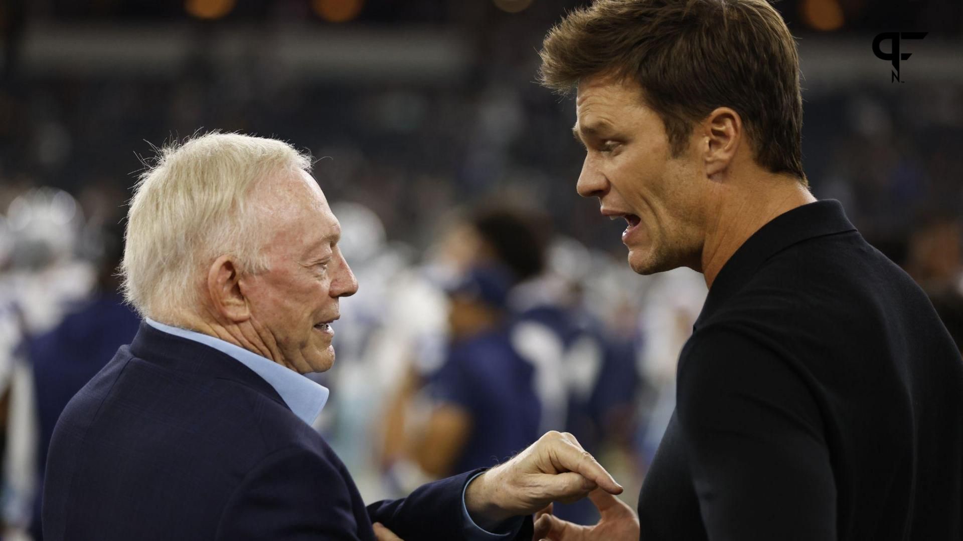 Dallas Cowboys owner Jerry Jones (L) talks to former NFL player Tom Brady (R) before the game against the Las Vegas Raiders at AT&T Stadium.