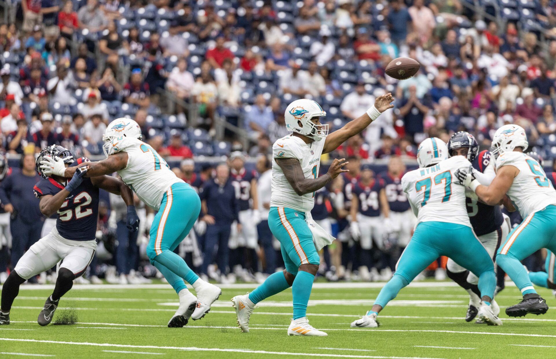Miami Dolphins quarterback Tua Tagovailoa (1) passes against the Houston Texans in the first quarter at NRG Stadium.