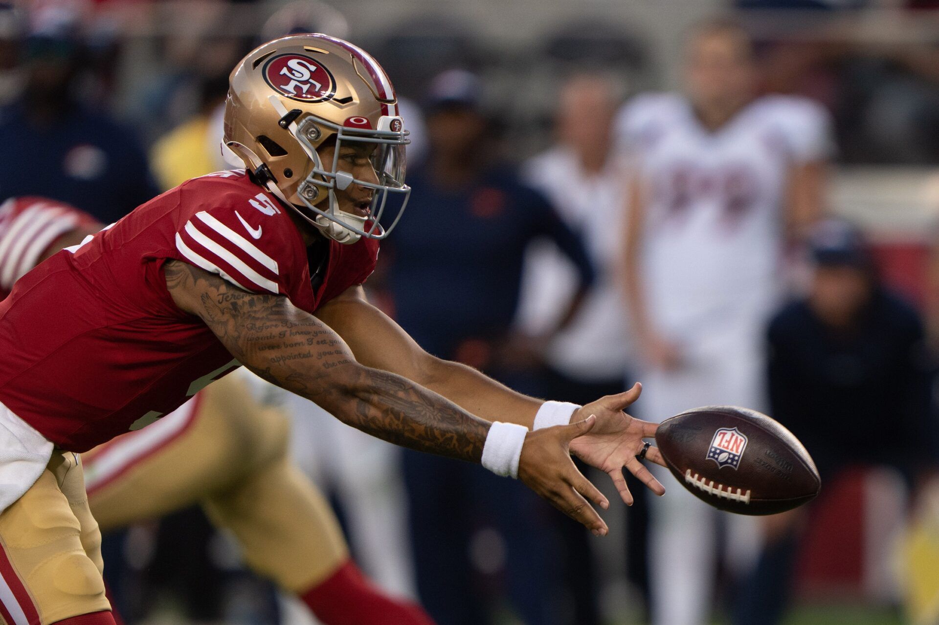 San Francisco 49ers QB Trey Lance (5) tosses the ball against the Denver Broncos.