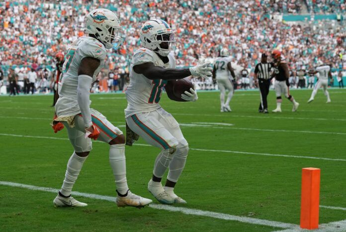 Miami Dolphins wide receiver Tyreek Hill (10) celebrates a touchdown against the Cleveland Browns in the third quarter with wide receiver Jaylen Waddle (17) at Hard Rock Stadium in Miami Gardens, Nov. 13, 2022.