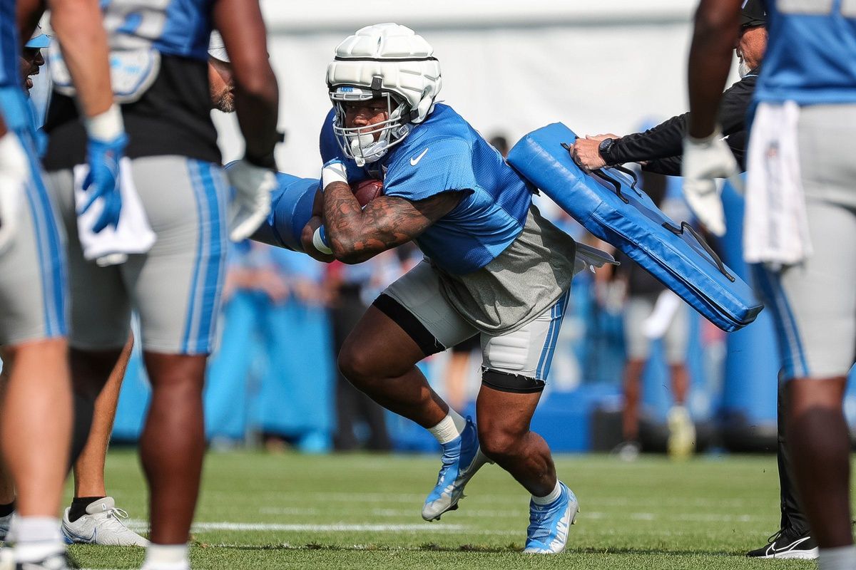 David Montgomery (5) runs a drill during a joint practice with New York Giants at Detroit Lions headquarters and training facility in Allen Park.