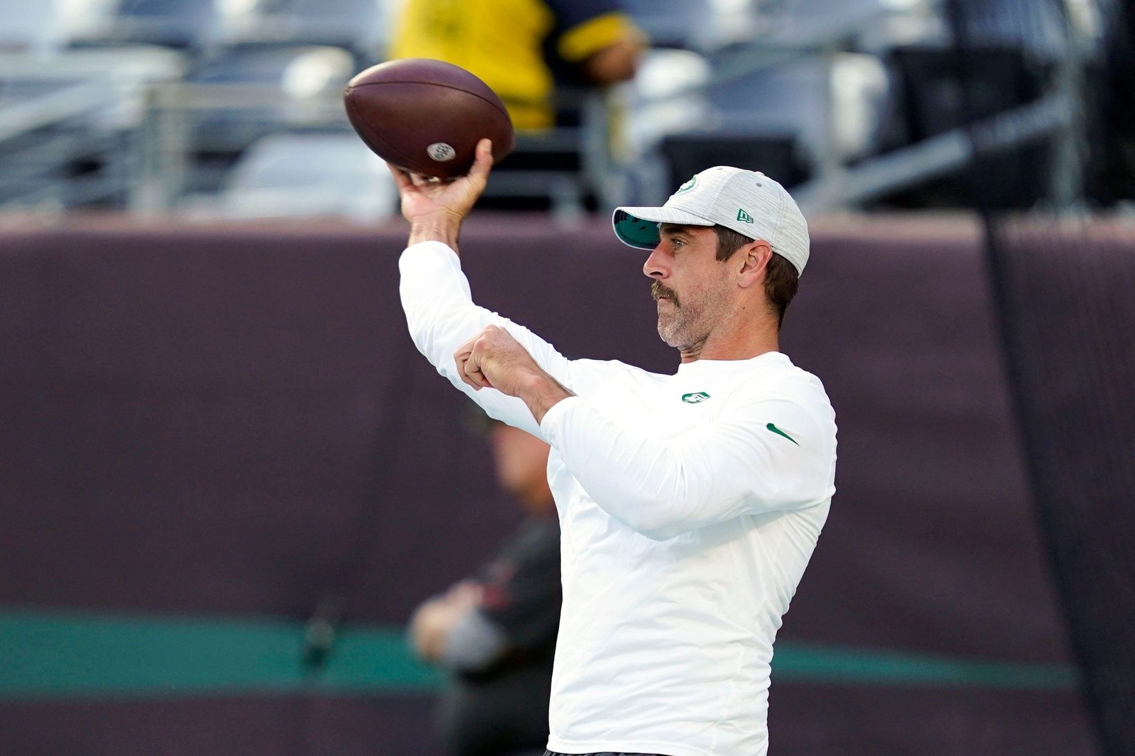 Aaron Rodgers throws the ball during warmups before a preseason NFL game at MetLife Stadium.
