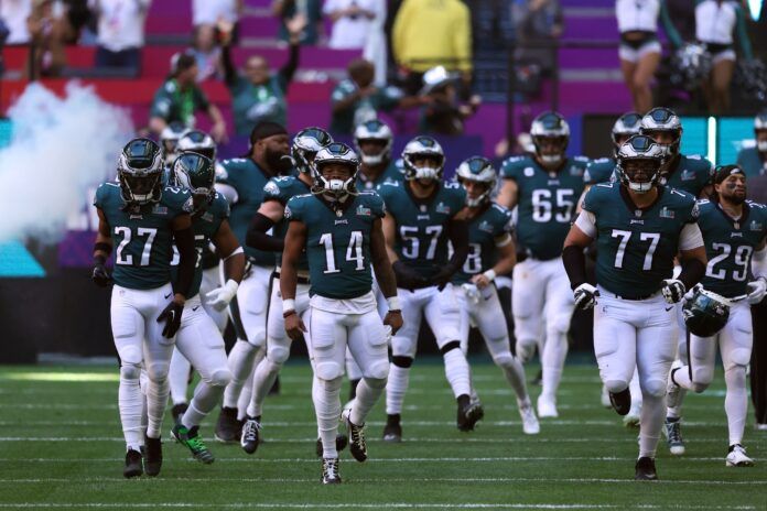 The Philadelphia Eagles team is introduced before Super Bowl LVII.