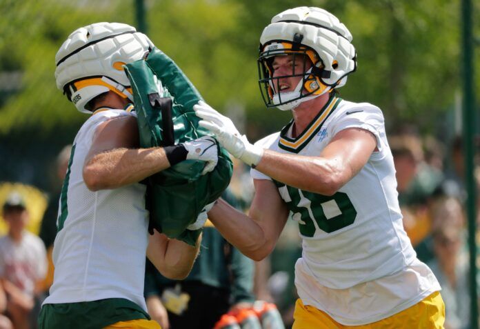 Green Bay Packers TE Luke Musgrave (88) in a tight end drill during training camp.