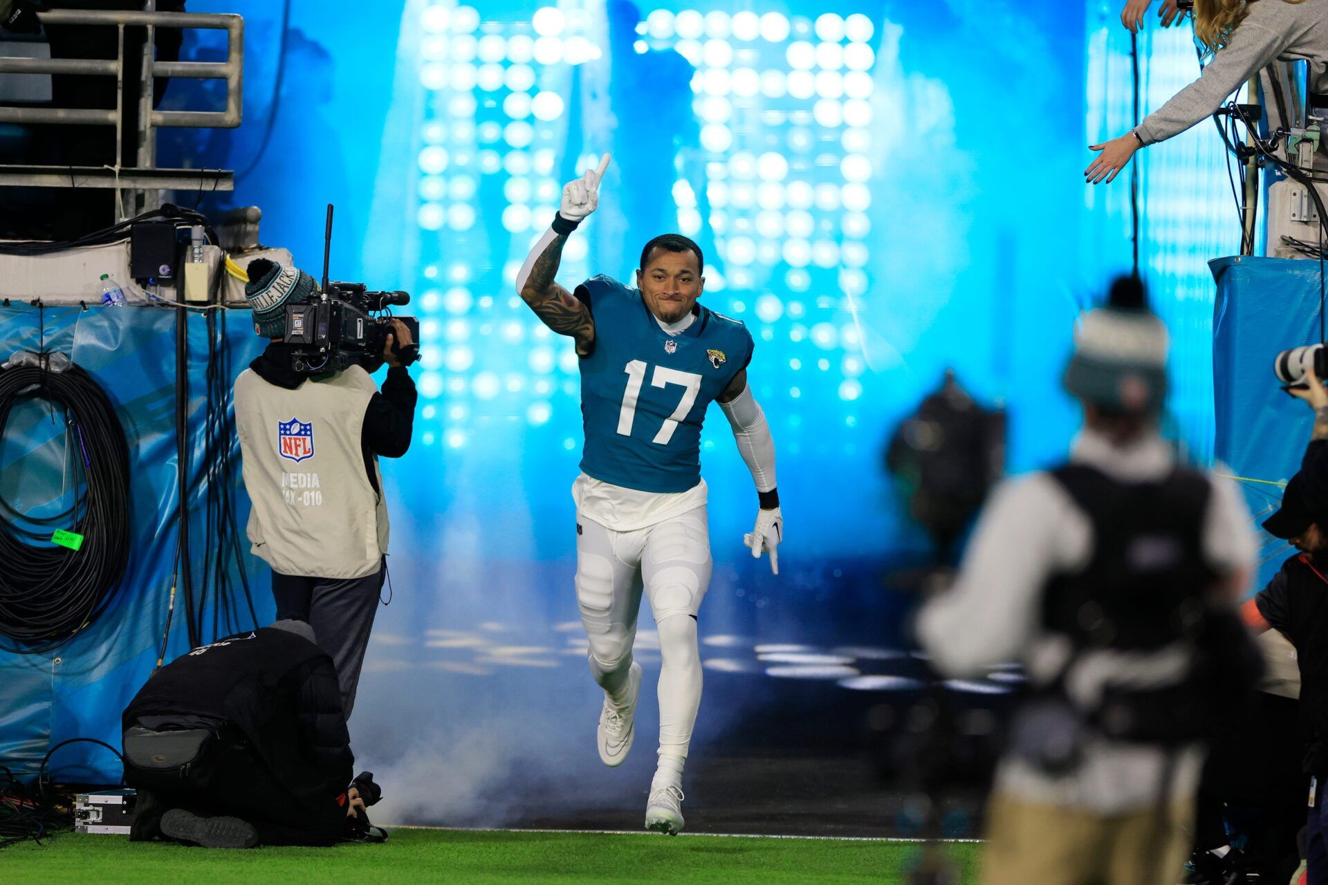 Jacksonville Jaguars tight end Evan Engram (17) is introduced before an NFL first round playoff football matchup Saturday, Jan. 14, 2023 at TIAA Bank Field in Jacksonville, Fla. The Jacksonville Jaguars edged the Los Angeles Chargers on a field goal 31-30.