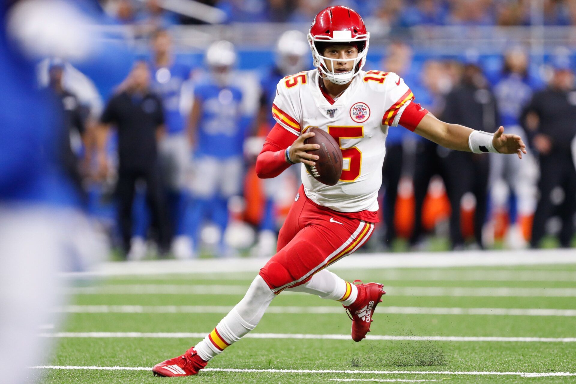 Patrick Mahomes (15) runs with the ball during the fourth quarter against the Detroit Lions at Ford Field.