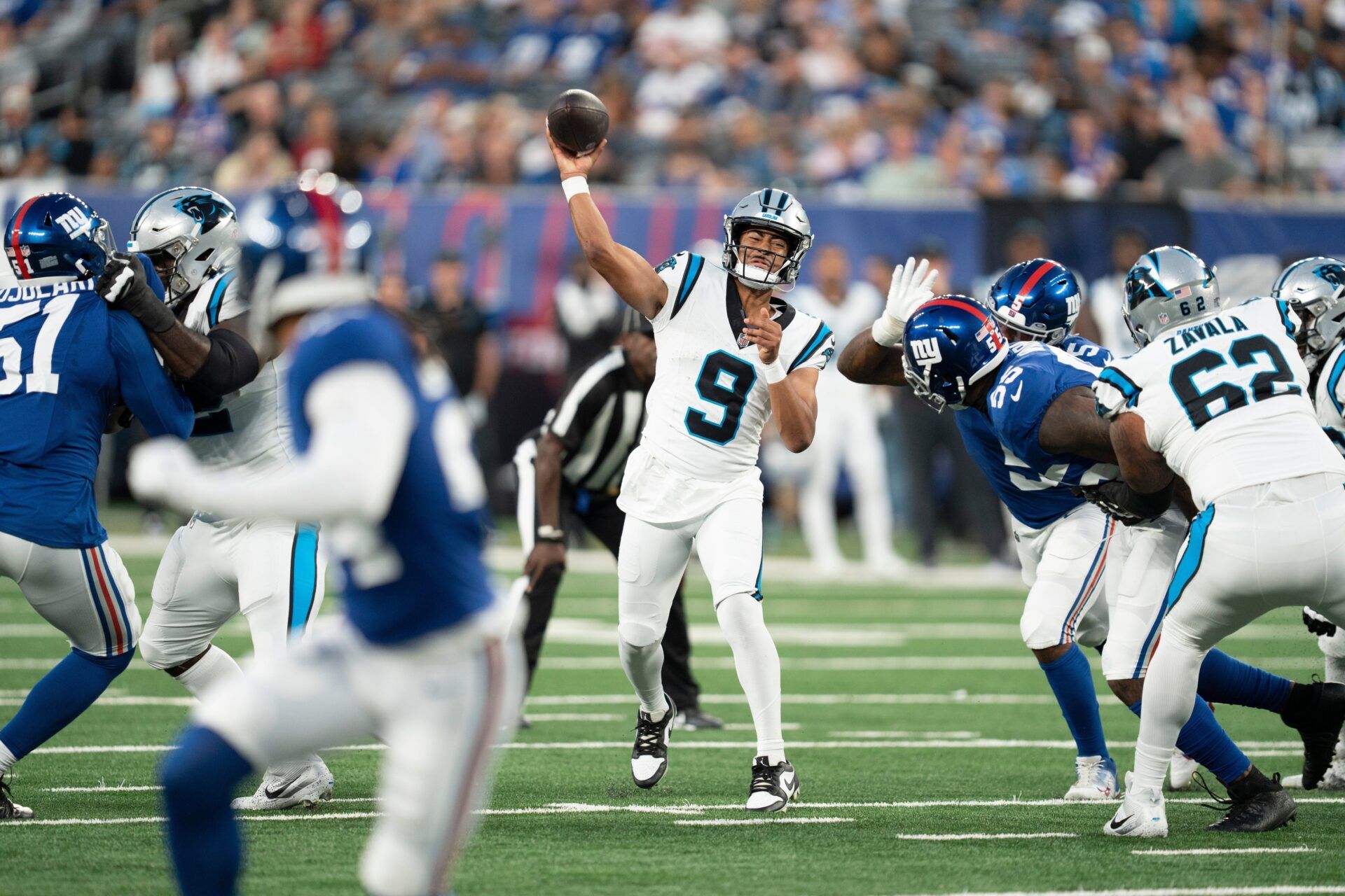 Bryce Young looks to throw during the preseason game against the Giants.