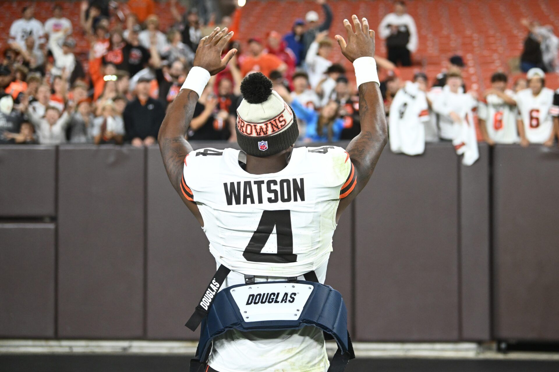 Cleveland Browns quarterback Deshaun Watson (4) acknowledges the crowd after the game against the Washington Commanders at Cleveland Browns Stadium.