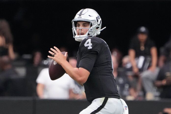 Las Vegas Raiders QB Aidan O'Connell (4) looks to pass against the San Francisco 49ers.