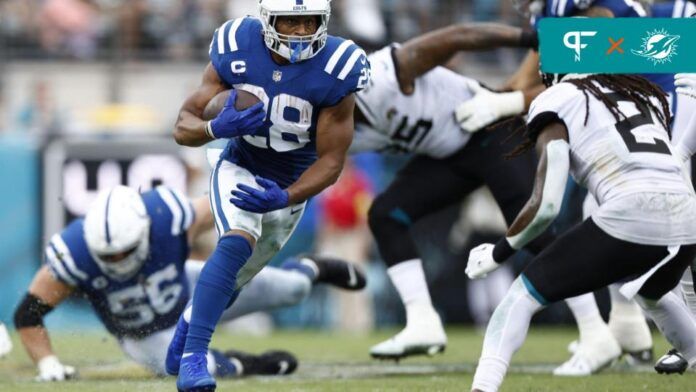 Indianapolis Colts RB Jonathan Taylor (28) runs with the football against the Jacksonville Jaguars.