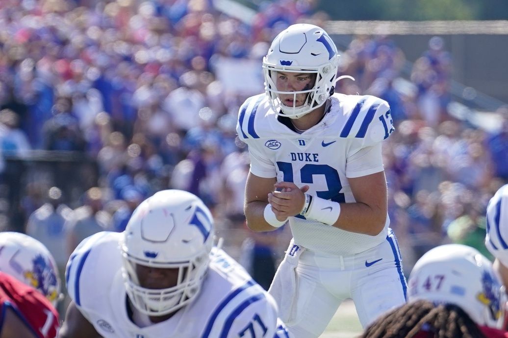 Riley Leonard (13) readies for the snap against the Kansas Jayhawks during the game at David Booth Kansas Memorial Stadium.