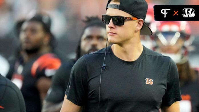 Cincinnati Bengals quarterback Joe Burrow (9) watches from the sideline during the team's first preseason game.