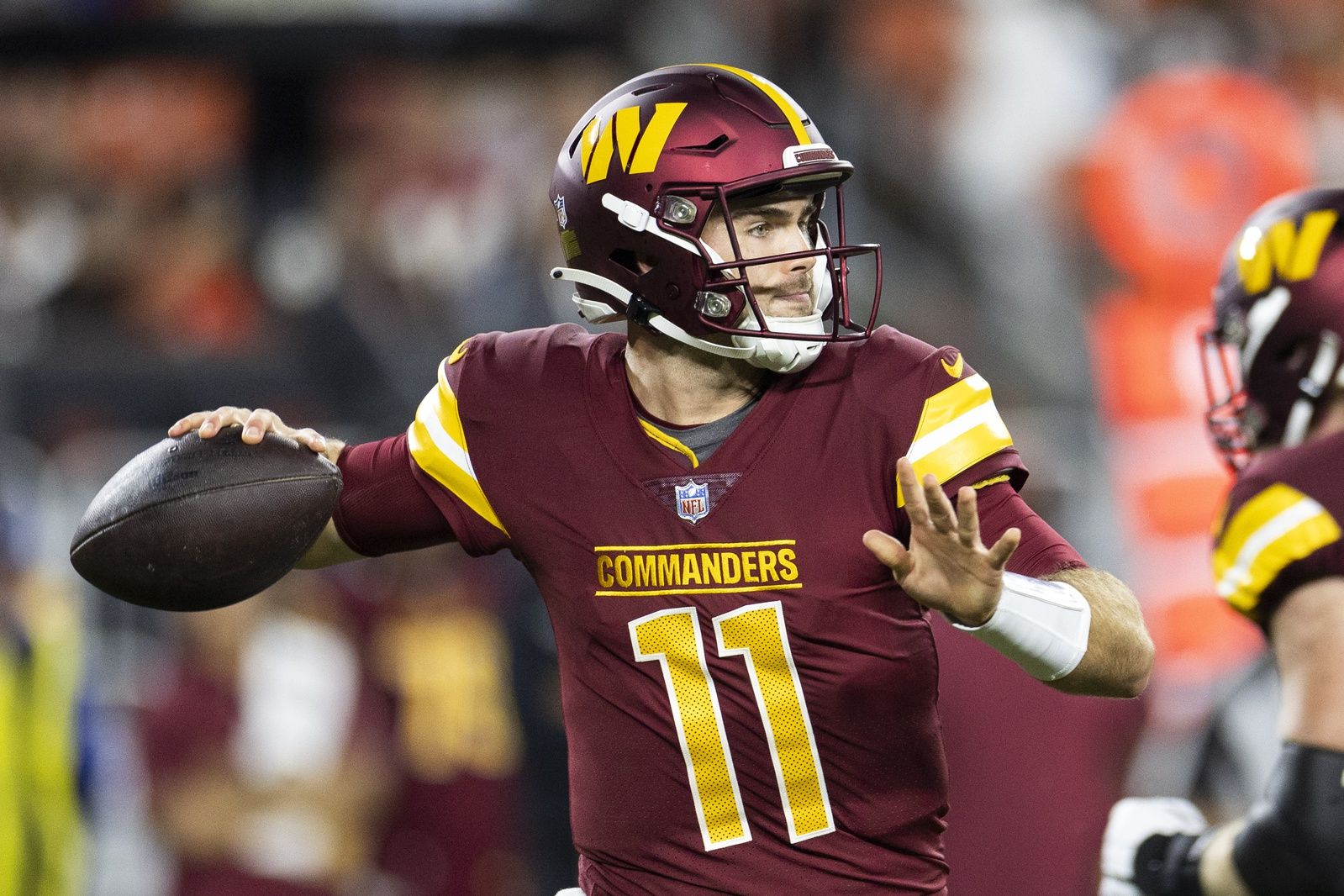 Washington Commanders QB Jake Fromm (11) throws a pass against the Cleveland Browns.