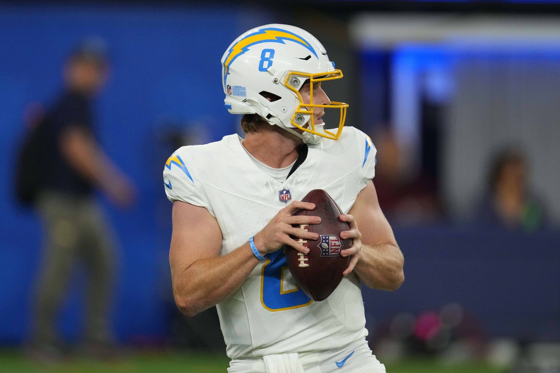 Los Angeles Chargers QB Max Duggan (8) drops back to pass.