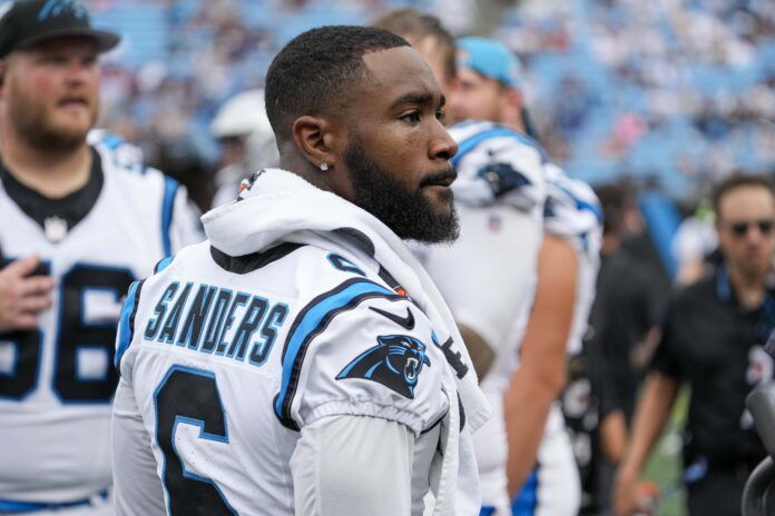 Carolina Panthers RB Miles Sanders (6) on the sidelines during the team's preseason game against the New York Jets.