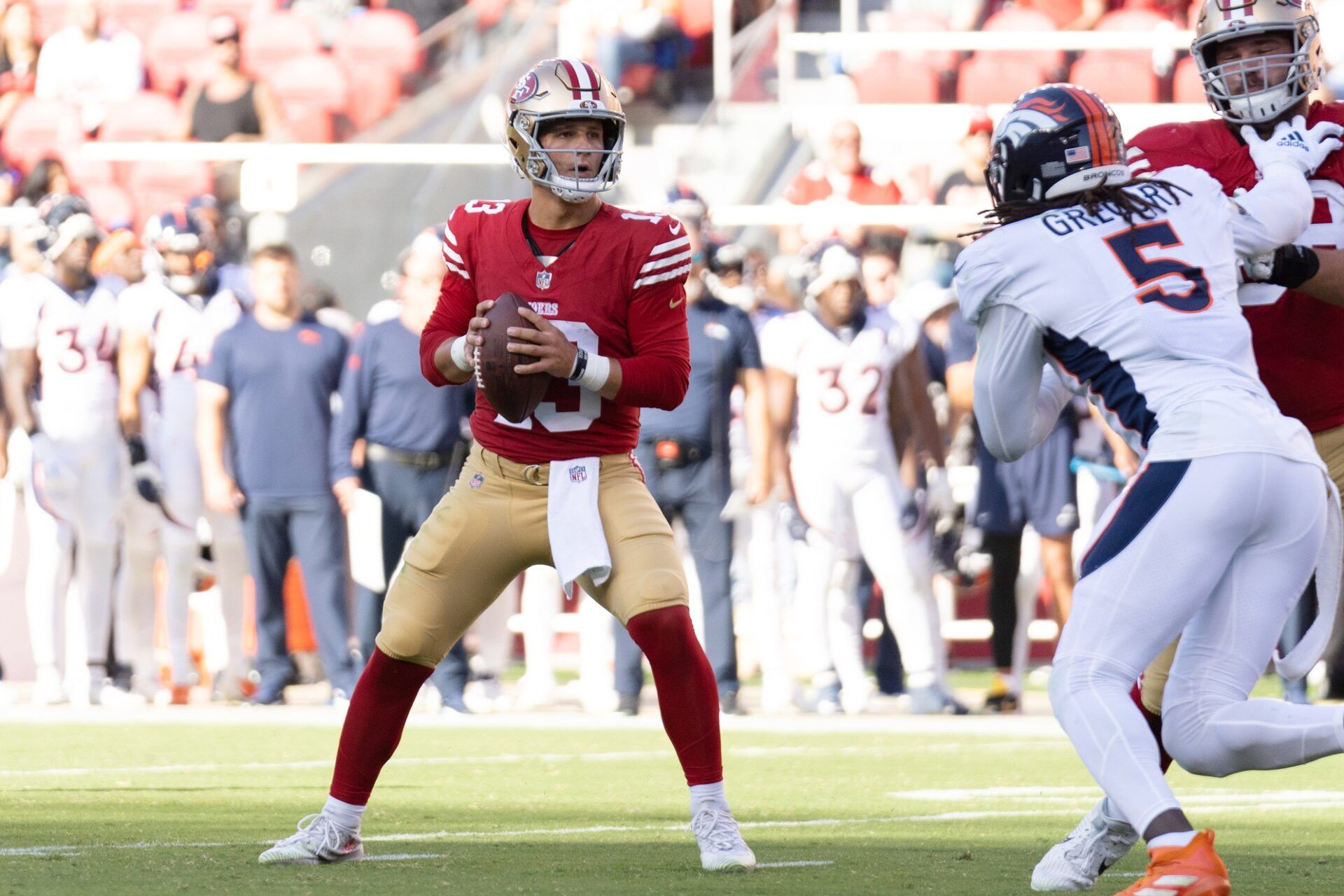 San Francisco 49ers QB Brock Purdy (13) looks to pass against the Denver Broncos.