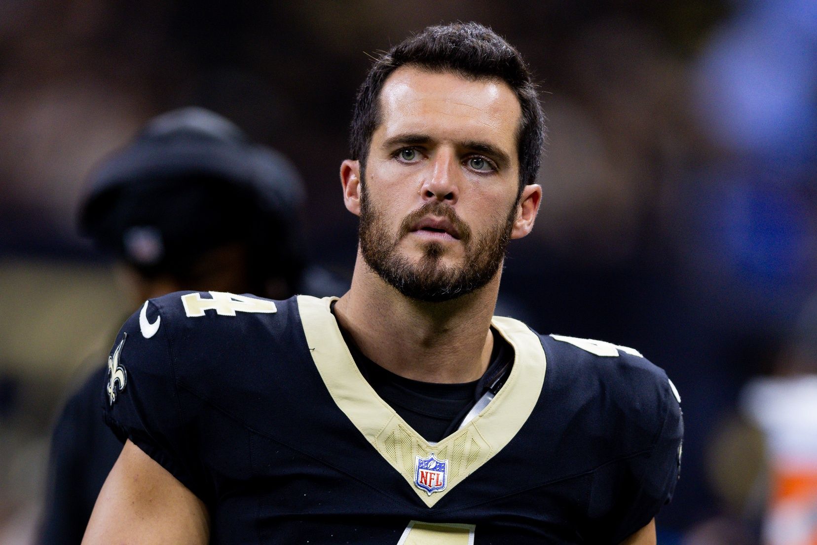 New Orleans Saints QB Derek Carr (4) looks on during the team's preseason game against the Kansas City Chiefs.