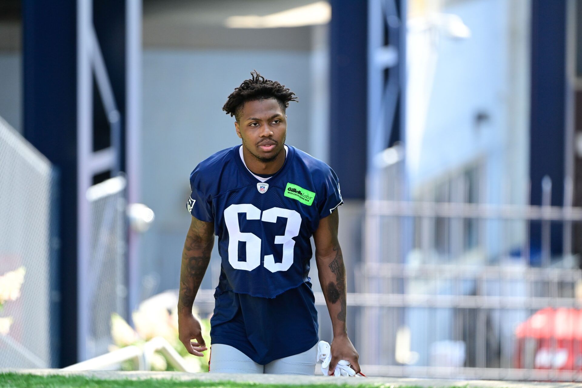 New England Patriots cornerback Isaiah Bolden (63) makes his way to the practice fields for training camp at Gillette Stadium.