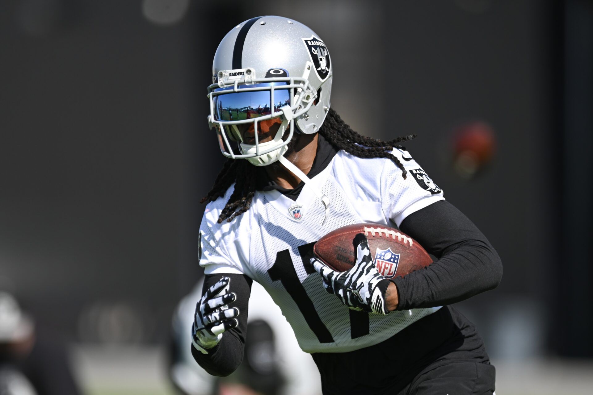Davante Adams (17) runs a drill during training camp at the Intermountain Health Performance Center.