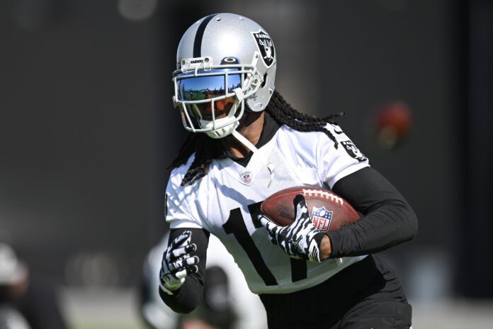 Davante Adams (17) runs a drill during training camp at the Intermountain Health Performance Center.