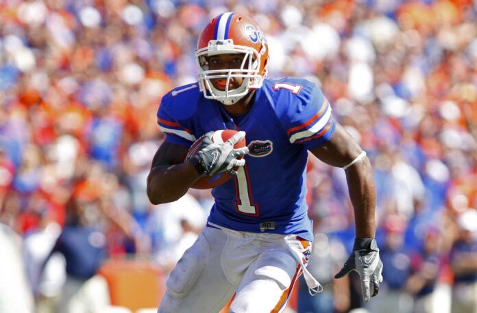 Percy Harvin (1) runs to score a touchdown against Mississippi Rebels during the fourth quarter at Ben Hill Griffin Stadium. Mississippi beat the Gators 31-30.