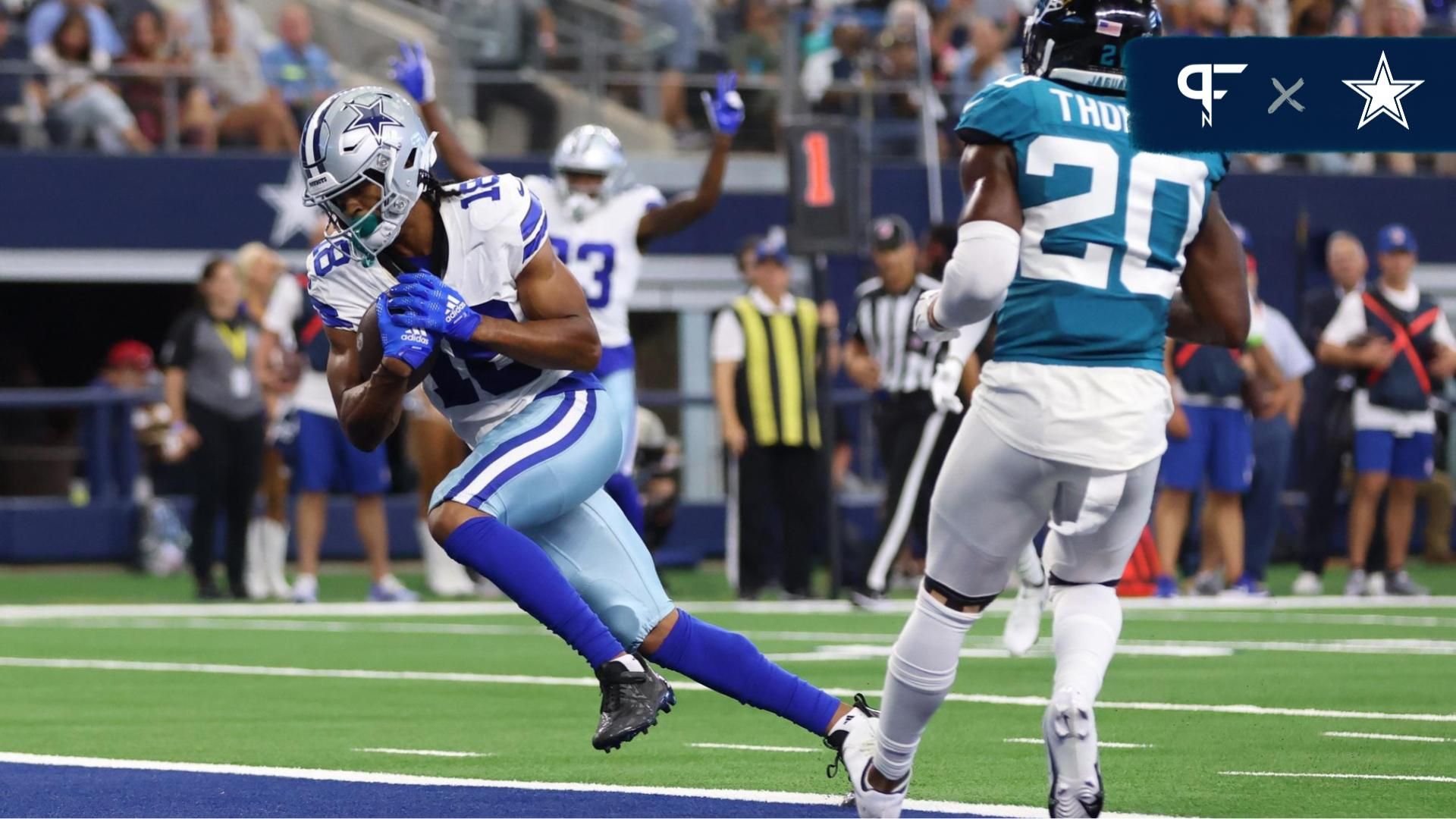 Dallas Cowboys wide receiver Jalen Tolbert (18) scores a touchdown against Jacksonville Jaguars safety Daniel Thomas (20) at AT&T Stadium.