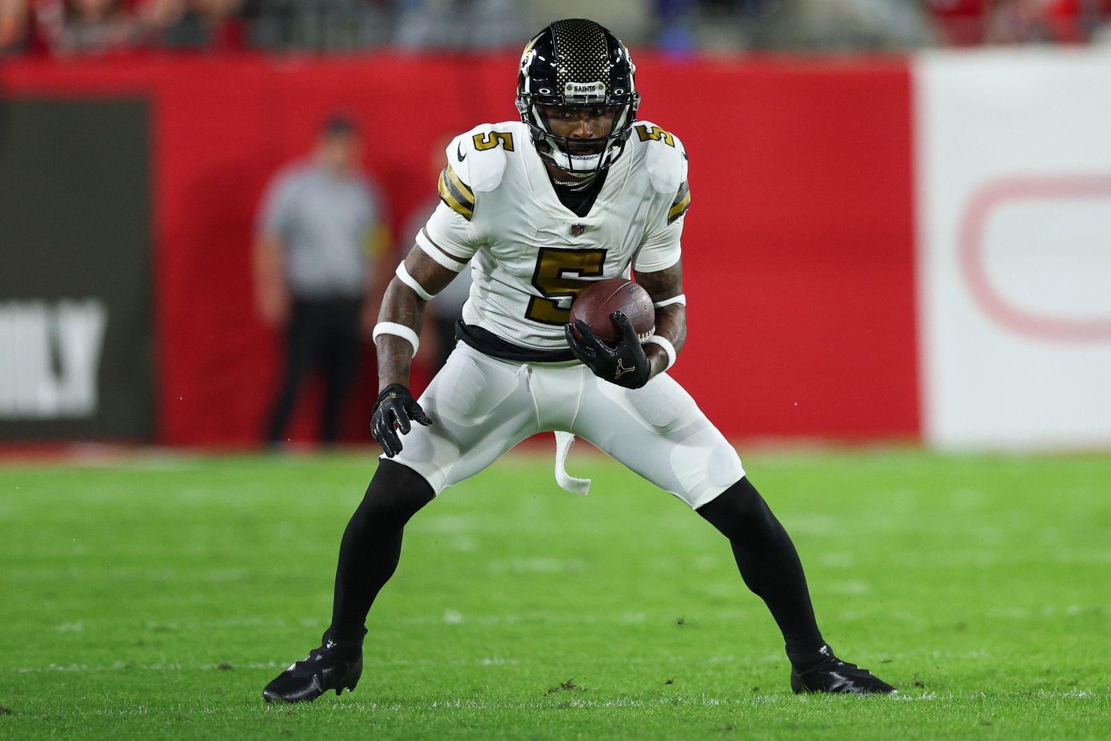 Jarvis Landry (5) runs with the ball against the Tampa Bay Buccaneers in the first quarter at Raymond James Stadium.