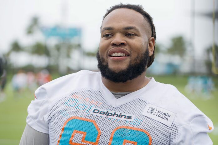 Miami Dolphins OL Robert Hunt (68) looks on during the team's minicamp.