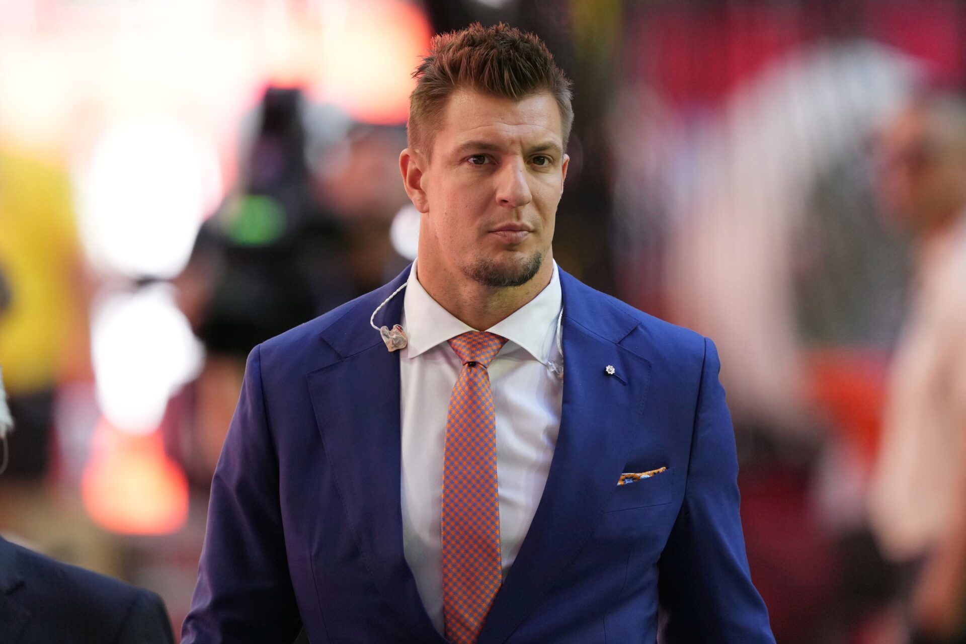 Rob Gronkowski looks on before Super Bowl LVII between the Kansas City Chiefs and the Philadelphia Eagles at State Farm Stadium.