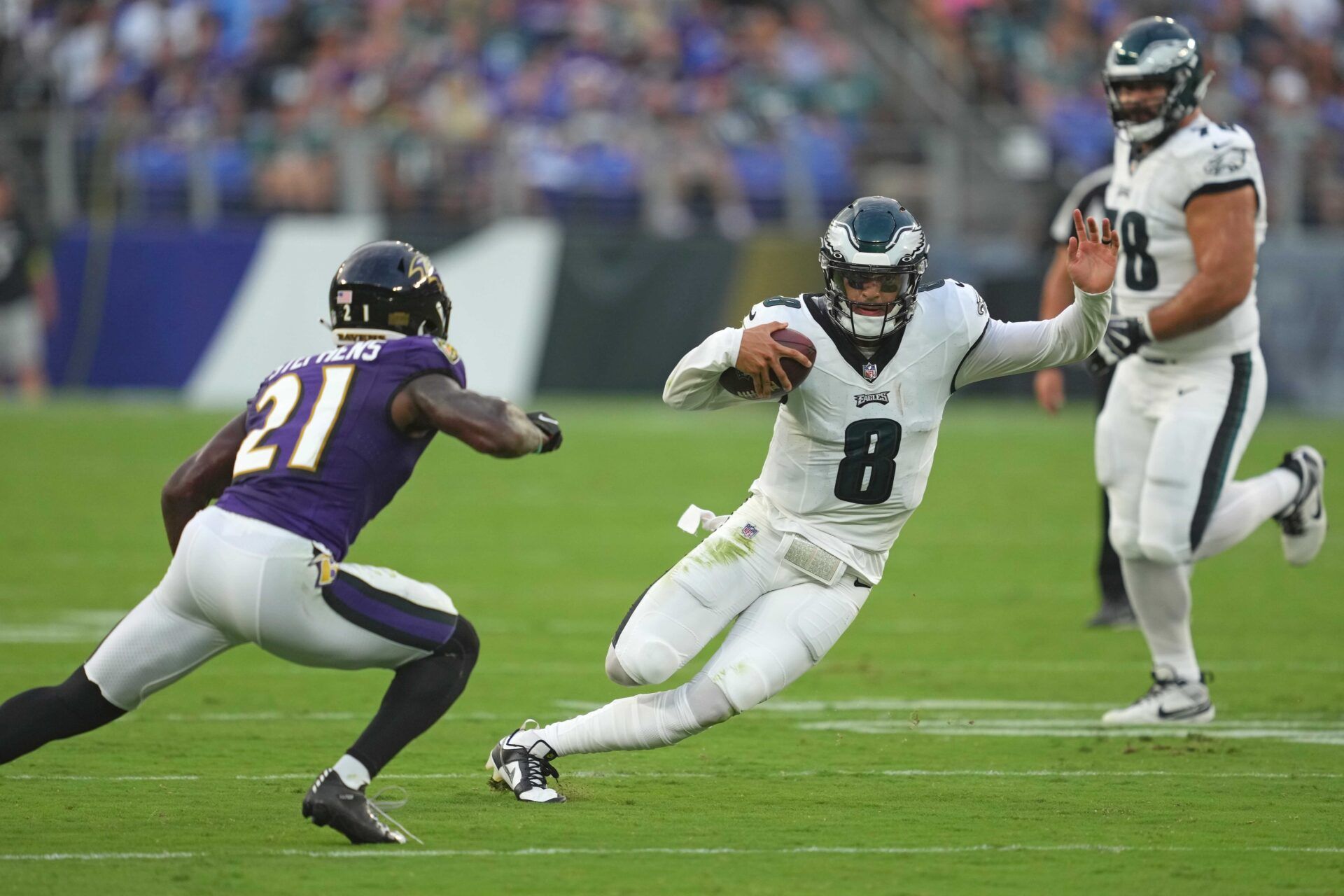 Philadelphia Eagles QB Marcus Mariota (8) slides against the Baltimore Ravens in a preseason game.