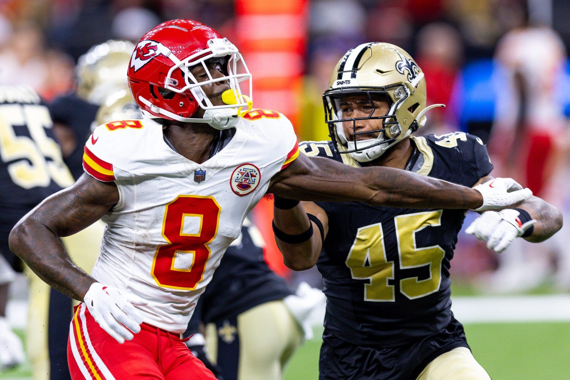 New Orleans Saints linebacker Nephi Sewell (45) blocks Kansas City Chiefs wide receiver Justyn Ross (8) on a punt.