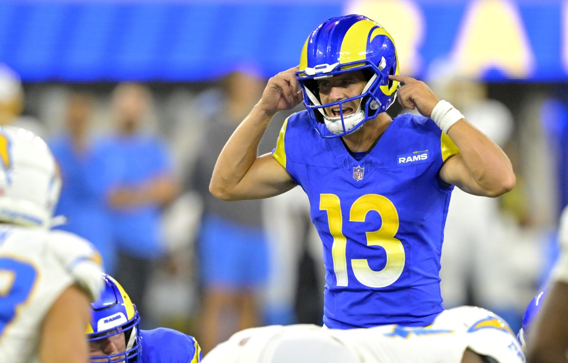 Los Angeles Rams QB Stetson Bennett (13) calls a play against the Los Angeles Chargers.