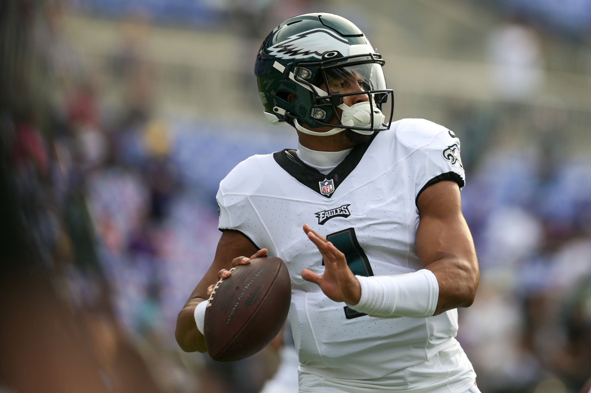 Jalen Hurts (1) warms up before the game against the Baltimore Ravens at M&T Bank Stadium. 