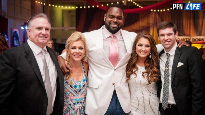 Former NFL offensive tackle Michael Oher and the Tuohy family.