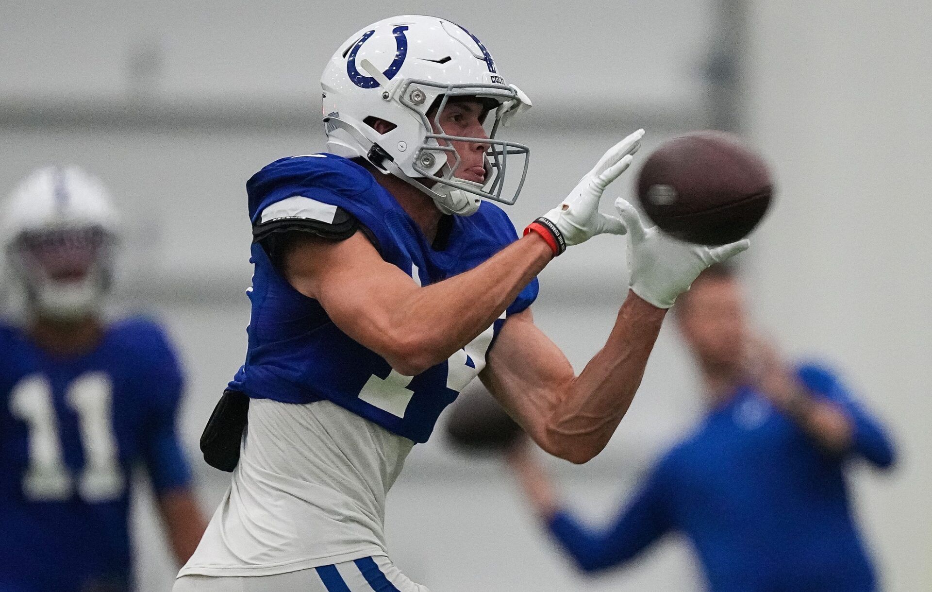 Alec Pierce (14) catches the ball Saturday, Aug. 5, 2023, during training camp at Grand Park Sports Campus in Westfield.