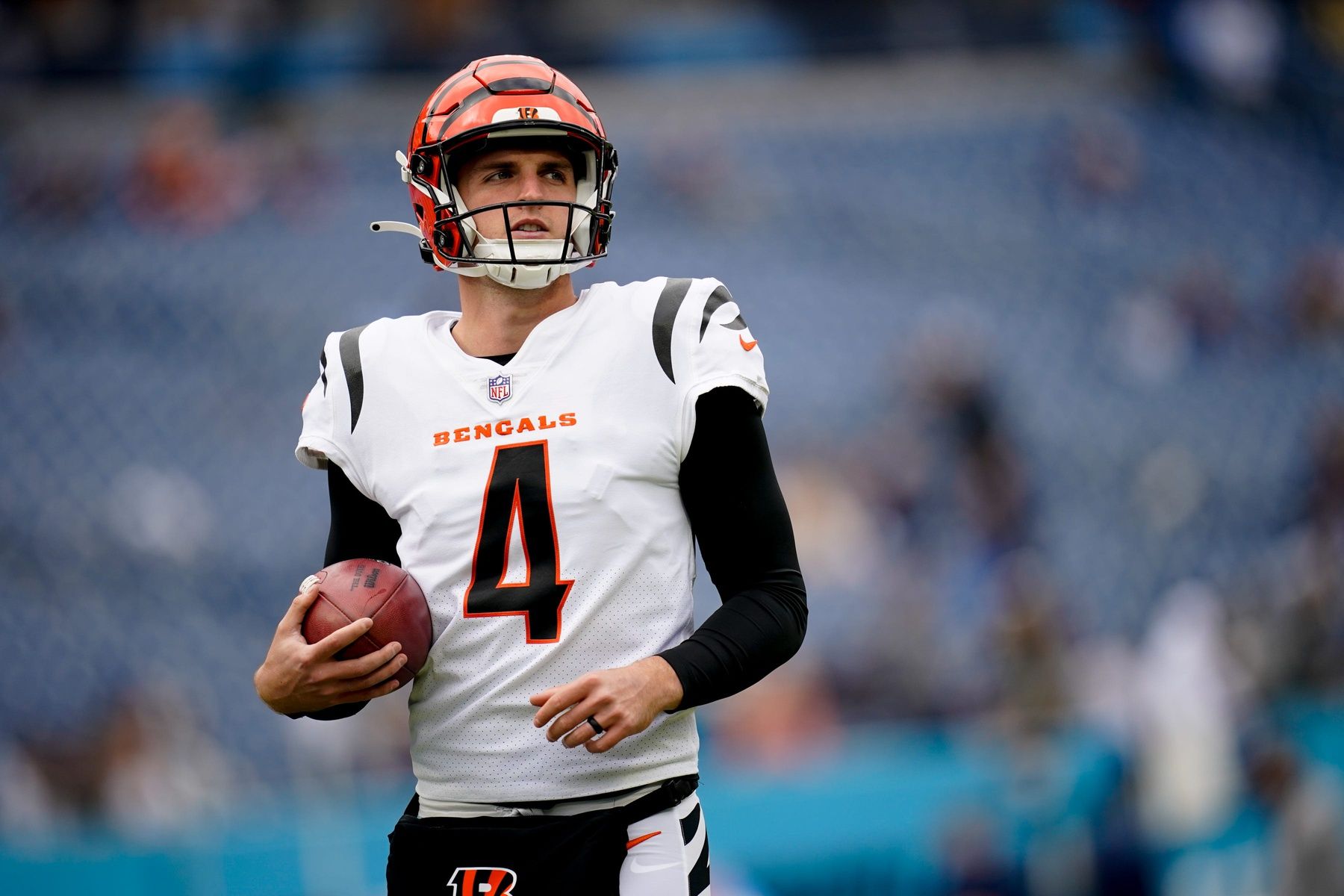 Drue Chrisman (4) warms up as the team gets ready to face the Tennessee Titans at Nissan Stadium.