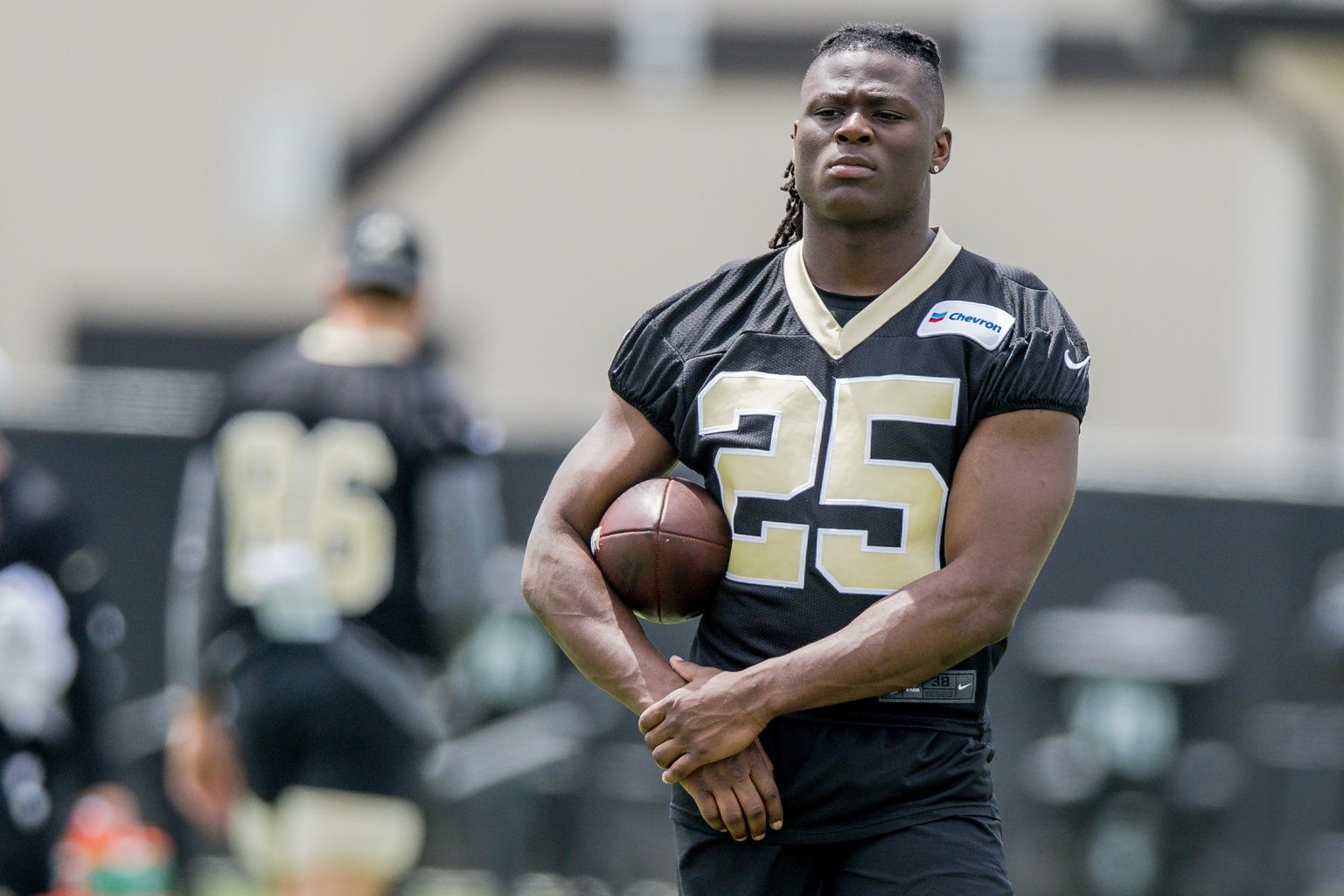 New Orleans Saints running back Kendre Miller (25) looks on during minicamp at the Ochsner Sports Performance Center.