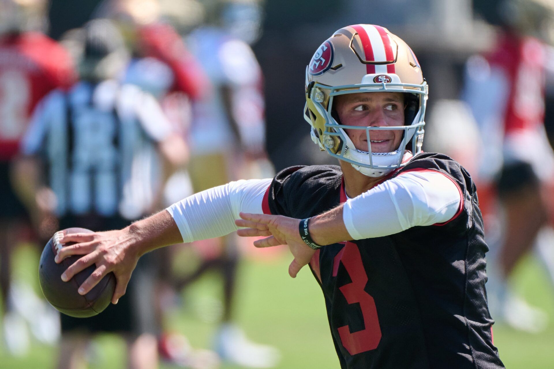 San Francisco 49ers quarterback Brock Purdy (13) throws a pass during training camp at the SAP Performance Facility.