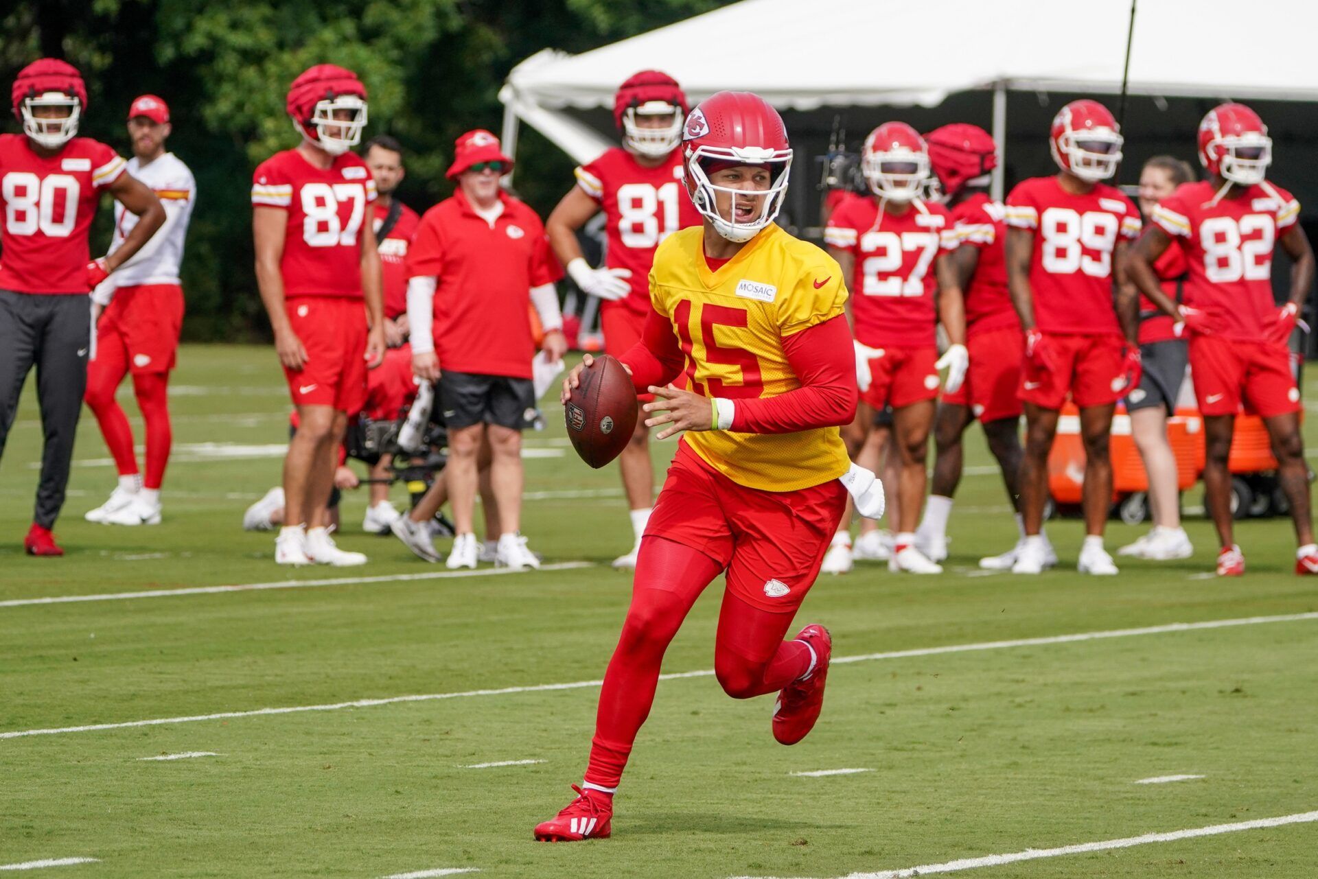 Kansas City Chiefs QB Patrick Mahomes (15) looks to throw during training camp practice.