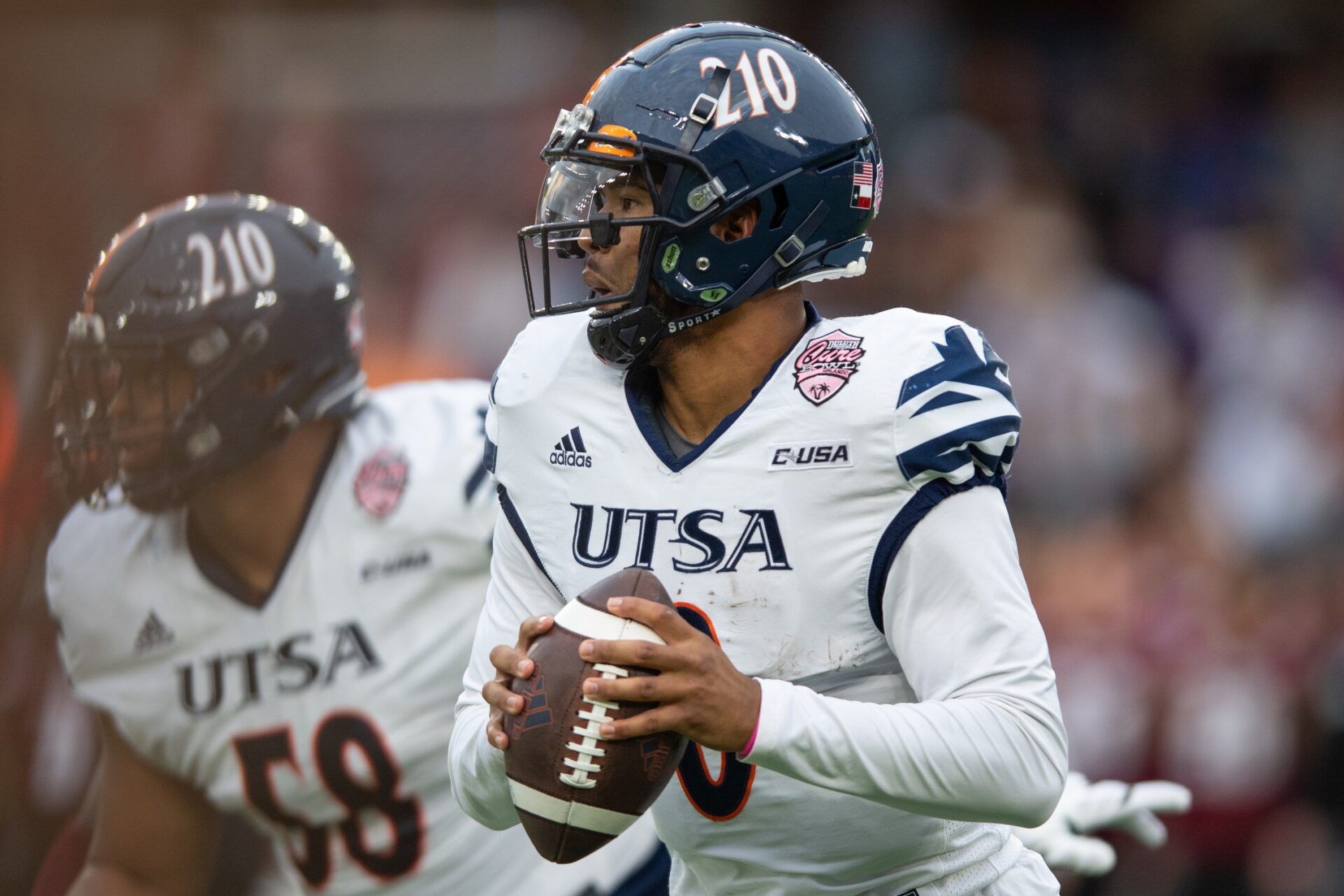 Frank Harris (0) throws the ball against Troy Trojans in the second quarter at Exploria Stadium.