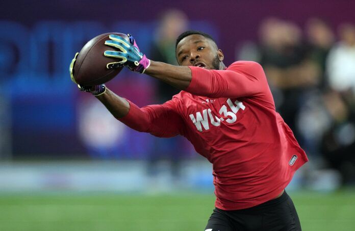 Marvin Mims (WO34) participates in drills at Lucas Oil Stadium.