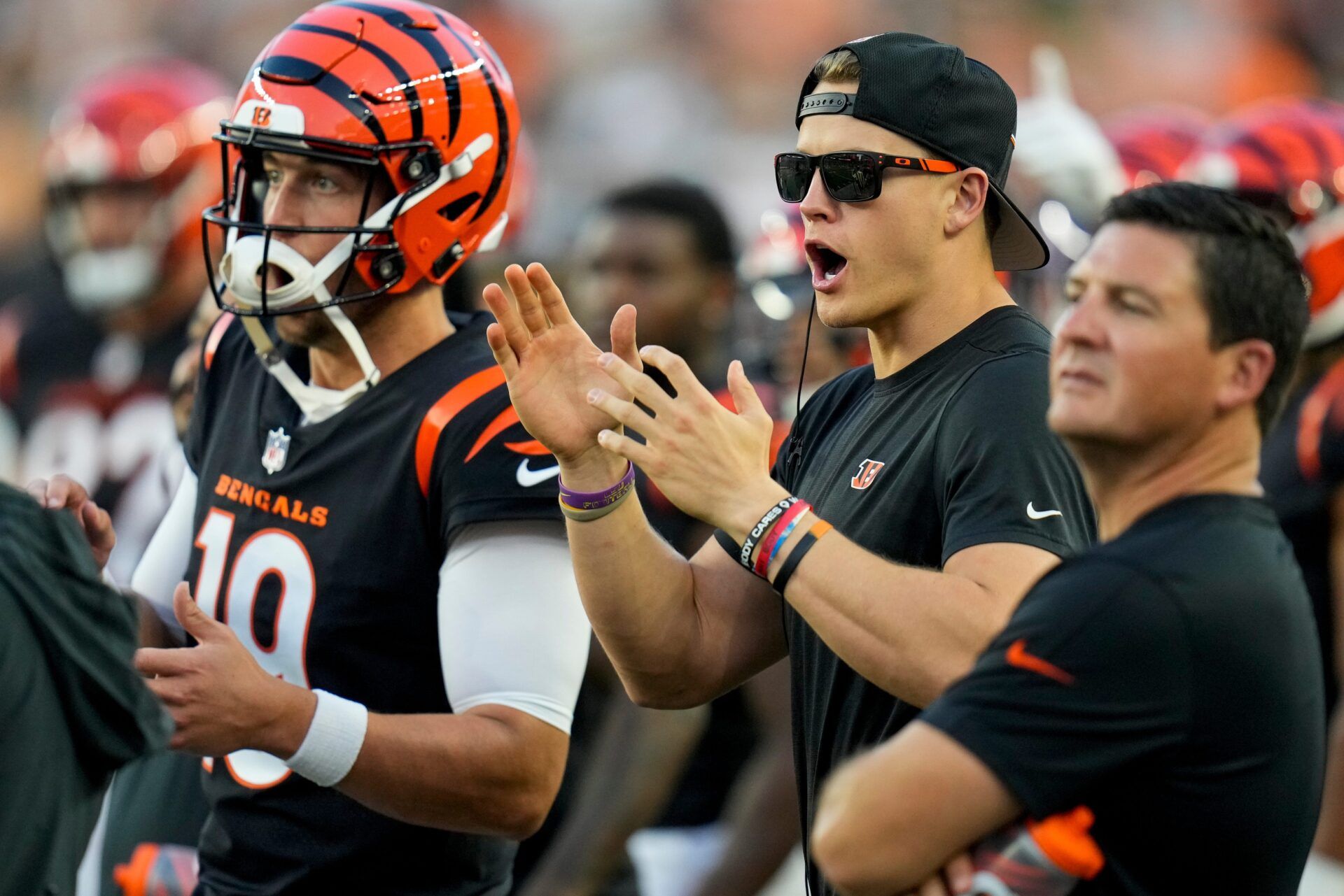 Cincinnati Bengals quarterback Joe Burrow (9) watches from the sideline in the second quarter of the NFL Preseason Week 1 game between the Cincinnati Bengals and the Green Bay Packers at Paycor Stadium in downtown Cincinnati on Friday, Aug. 11, 2023. The Packers led 21-16 at halftime.