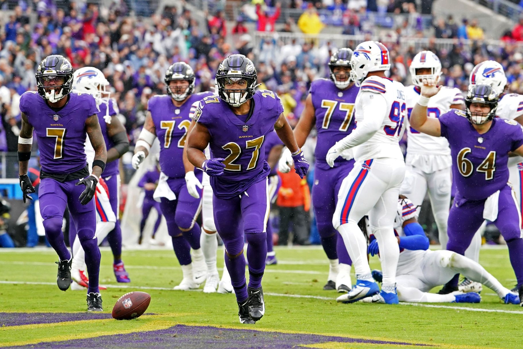 J.K. Dobbins (27) scores a first quarter touchdown against the Buffalo Bills at M&T Bank Stadium.