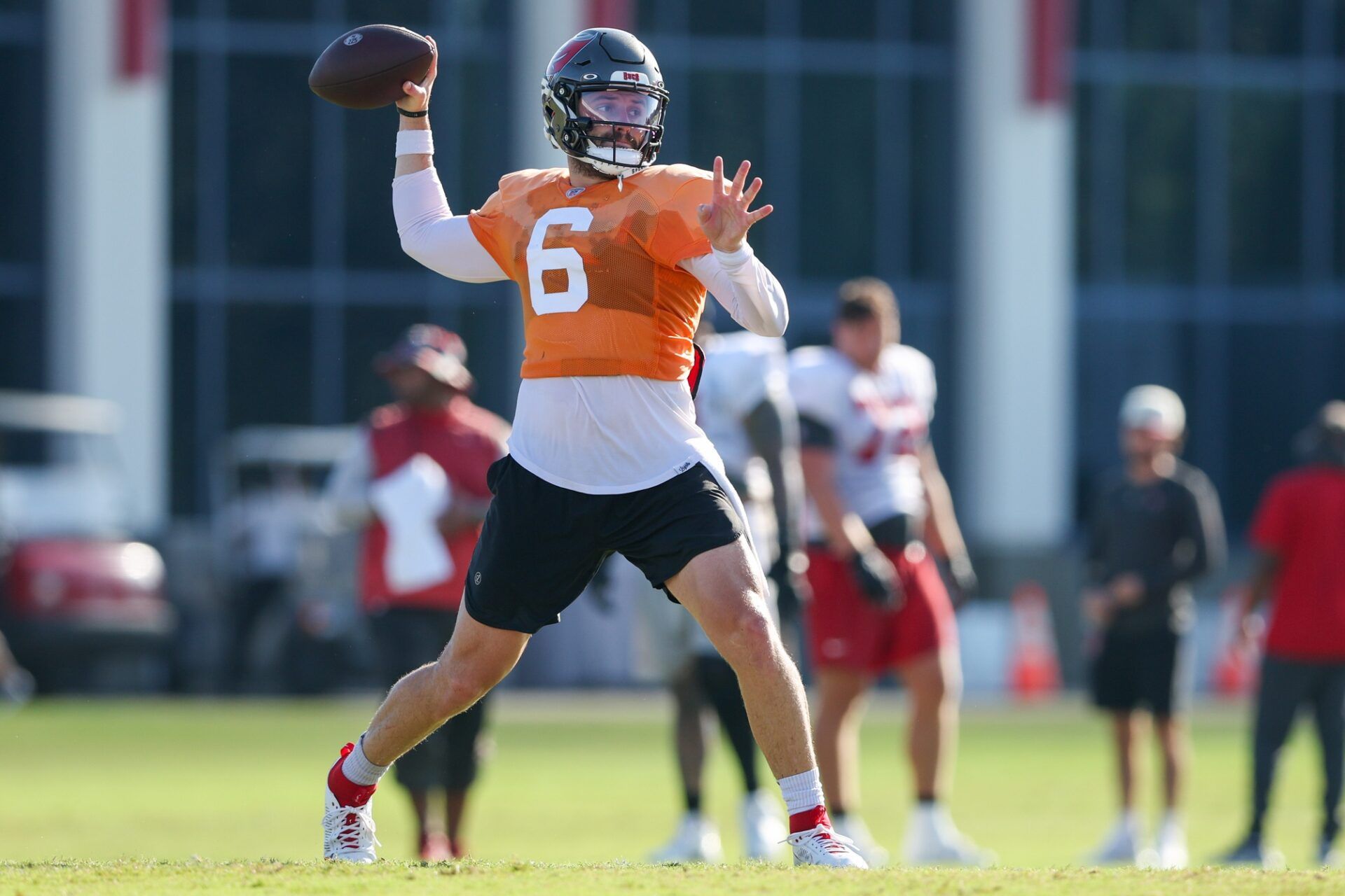 Tampa Bay Buccaneers QB Baker Mayfield (6) throws passes during training camp.