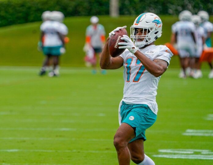 Jaylen Waddle (17) participates in training camp at Baptist Health Training Complex.