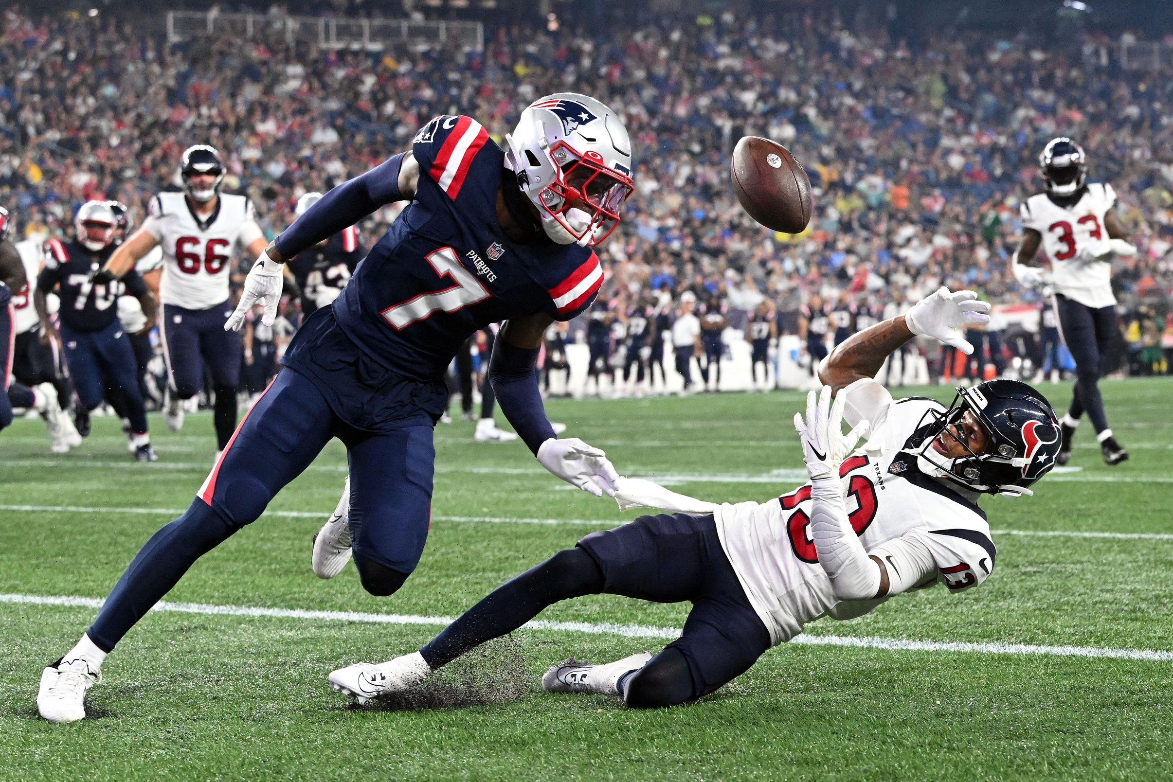 Houston Texans WR Tank Dell (13) makes a TD grab against the New England Patriots.